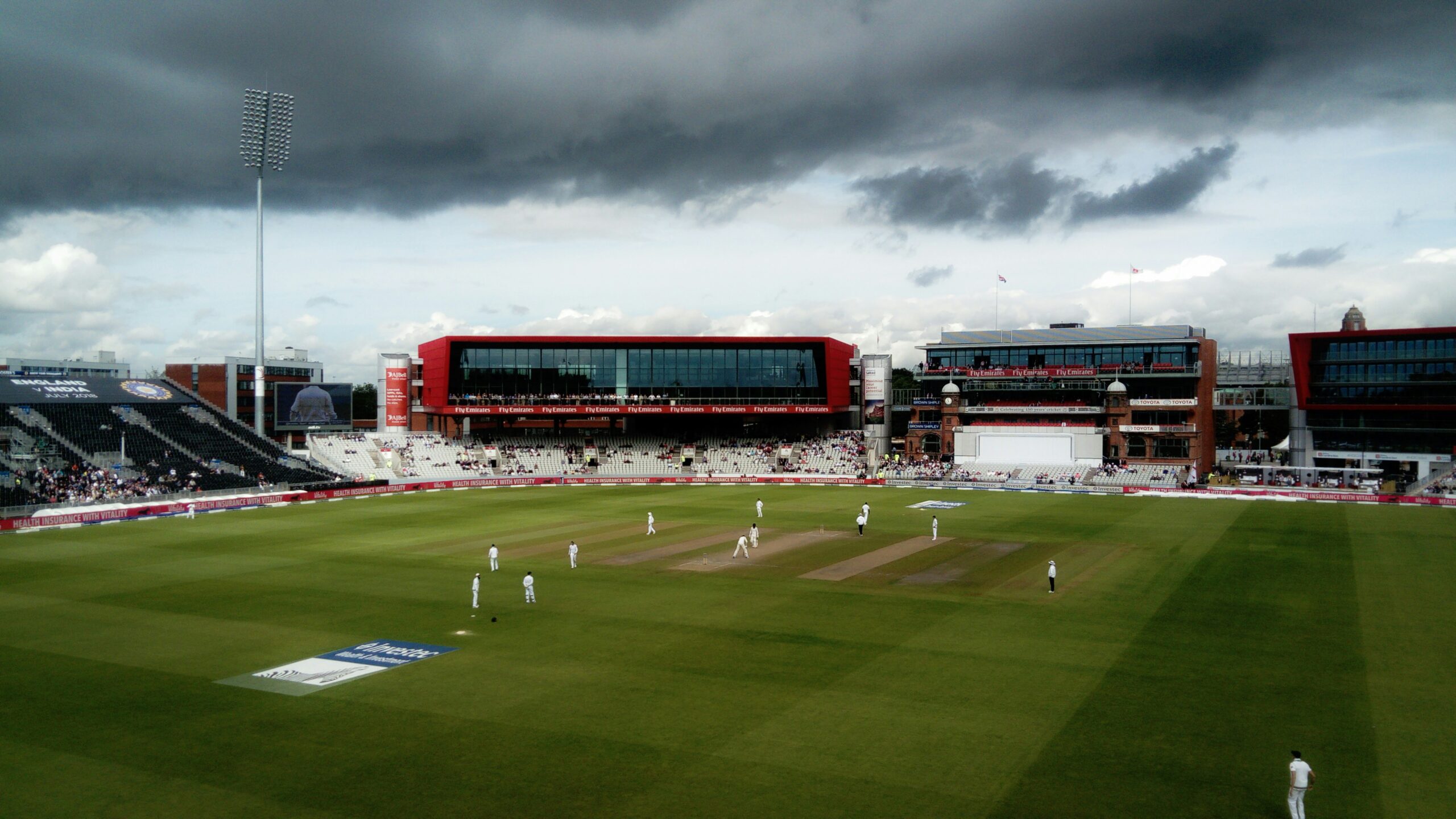 Test match underway at Old Trafford symbolizing the Bazball era in Test cricket.